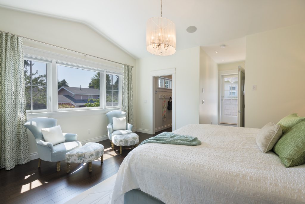 comfortable bedroom set up to wake with the sunshine